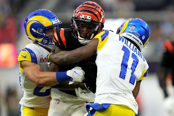 Cincinnati Bengals wide receiver Tee Higgins (85) competes for extra yardage after a catch as Los Angeles Rams cornerback Darious Williams (11) defends in the second quarter during Super Bowl 56, Sunday, Feb. 13, 2022, at SoFi Stadium in Inglewood, Calif. The Cincinnati Bengals lost, 23-30. Nfl Super Bowl 56 Los Angeles Rams Vs Cincinnati Bengals Feb 13 2022 1236